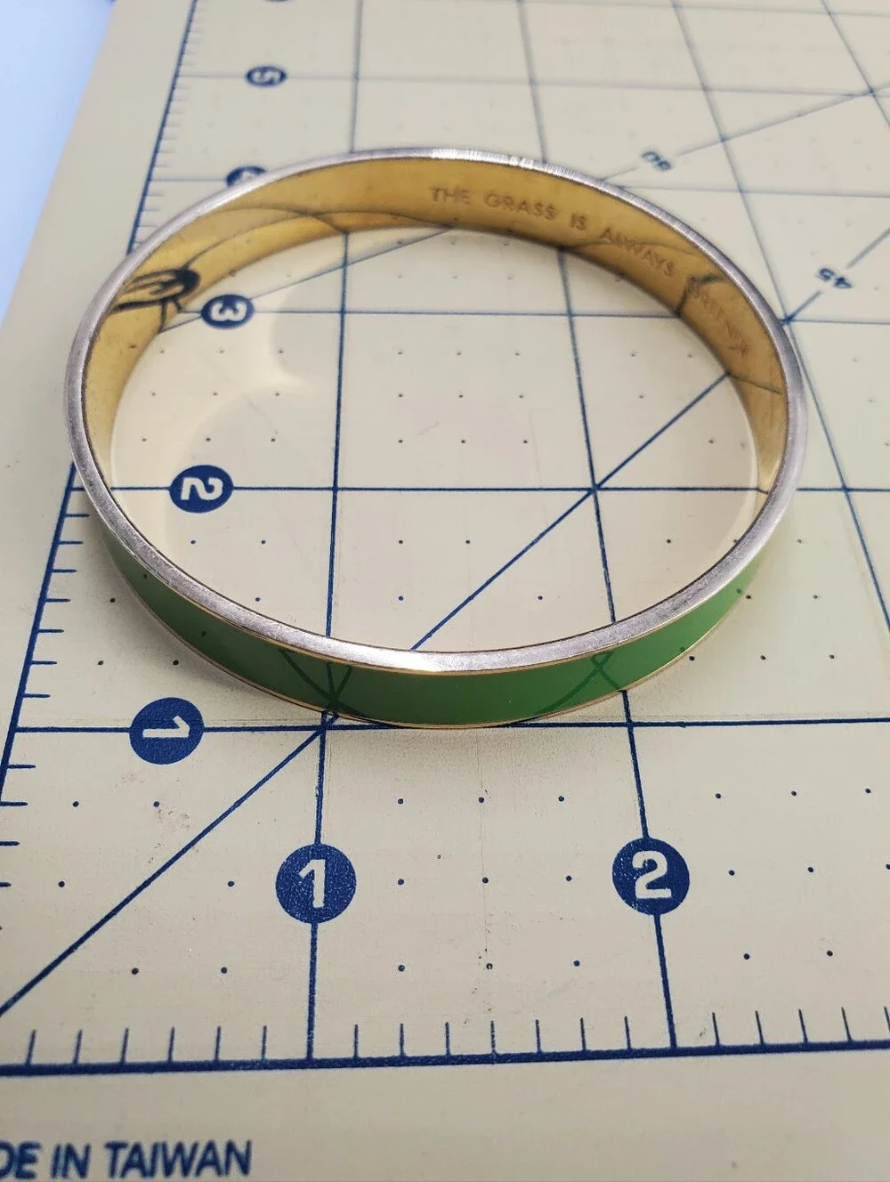 Two vibrant enamel and gold-plated bangle bracelets from Kate Spade New York. - Picture 15 of 17